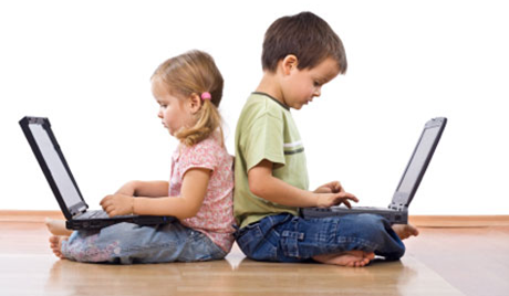 Boy and girl with computers